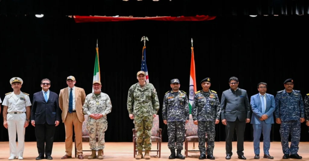 Multinational naval officers during command ceremony linked to Combined Task Force 154