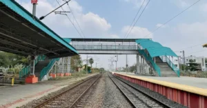 Indian Railways station infrastructure showing doubled tracks and electrified corridor