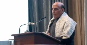 Defence Minister addressing an official event related to Miniratna Category-I status announcement