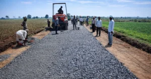 Rural road construction work underway under the Pradhan Mantri Gram Sadak Yojana
