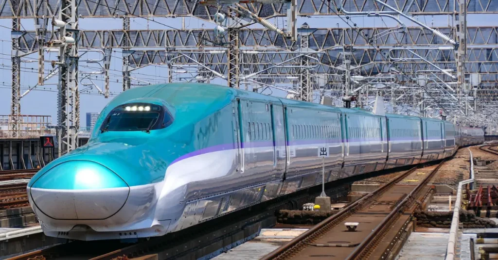 Mumbai-Ahmedabad bullet train project high-speed rail train on elevated track