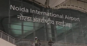 Terminal building signage at Noida International Airport in Jewar.