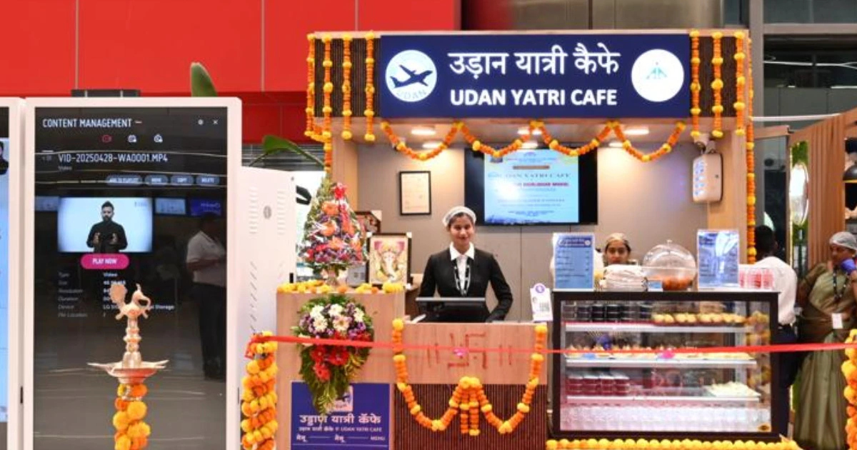 UDAN Yatri Cafe counter inside an Indian airport terminal offering affordable food to passengers