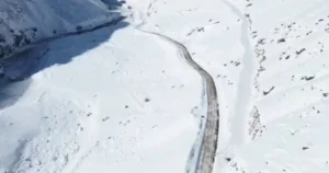 Snow-covered Zojila Pass road connecting Ladakh and the Kashmir Valley