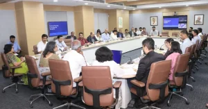 A conference room filled with officials and stakeholders attending the National Steering Committee meeting under the PM-SETU scheme.