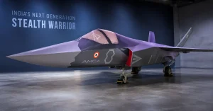 AMCA full-scale fighter jet model in an aerospace integration and testing environment.
