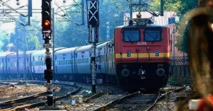 Indian Railways train on an electrified railway track