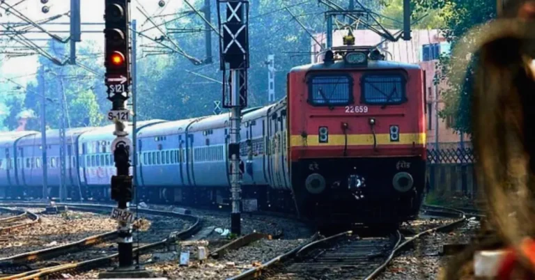 Indian Railways train on an electrified railway track