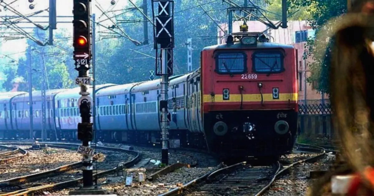 Indian Railways train on an electrified railway track