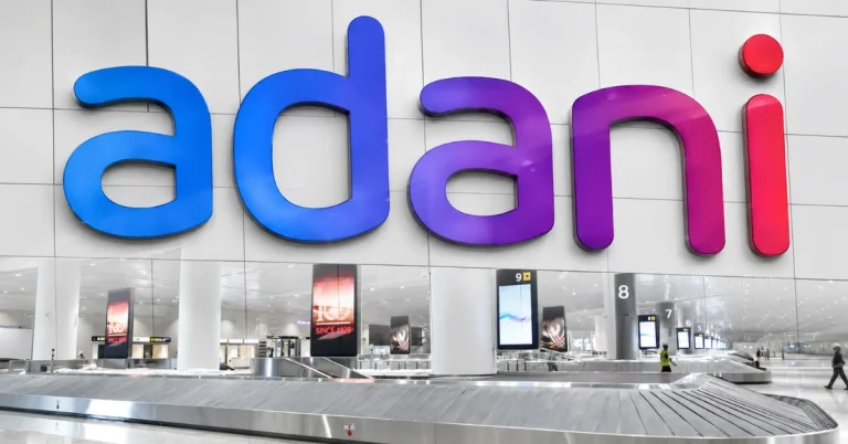 Adani Airports terminal interior with baggage handling facilities