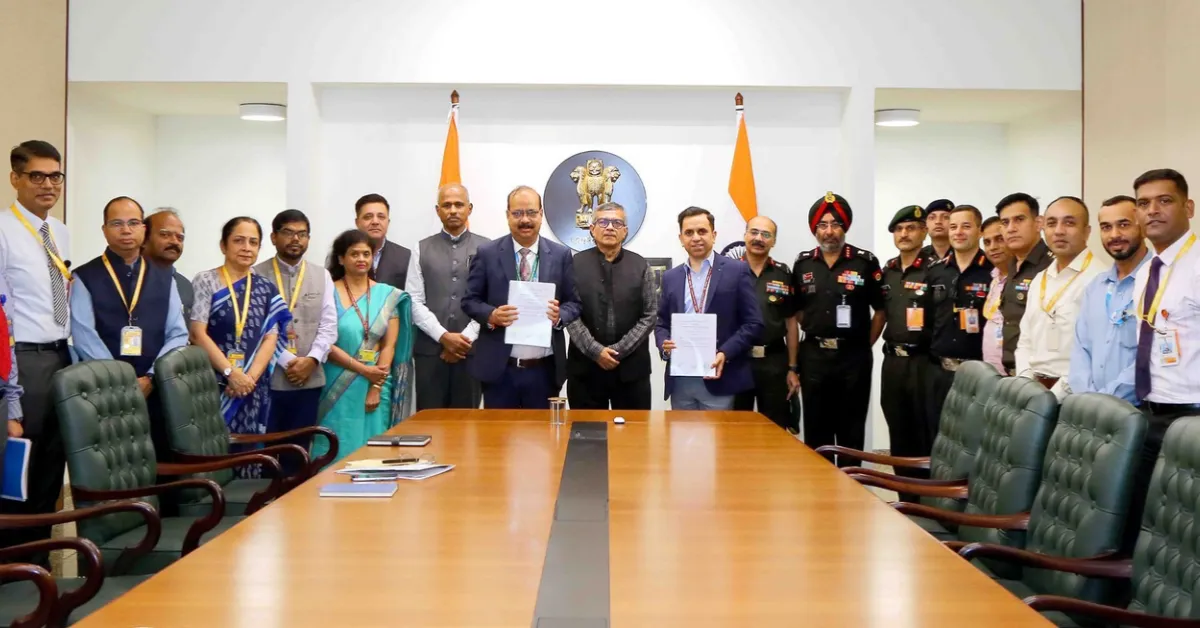 Defence Ministry and Bharat Electronics representatives holding contract documents during the ₹770 crore Indian Army surveillance radar procurement ceremony in New Delhi.