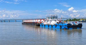 Dibrugarh Bogibeel cargo vessel carrying methanol containers on National Waterway-2
