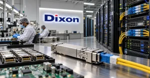 Optical transceivers on a manufacturing workbench with Dixon production technicians and data centre networking racks in the background.