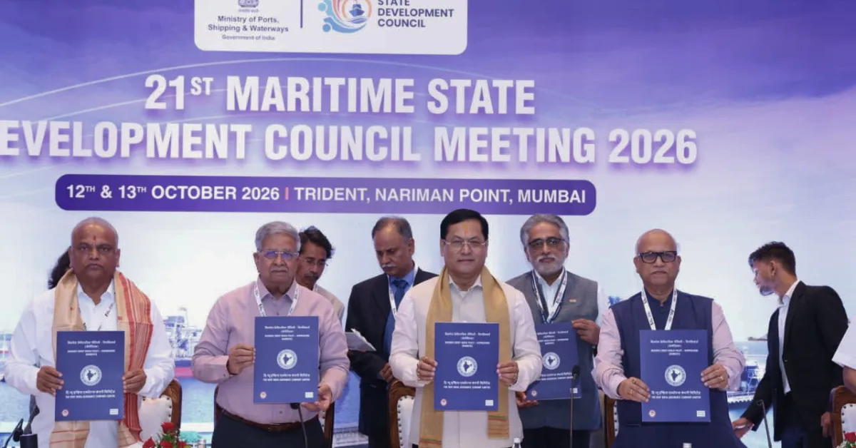 Government officials display official publications at the 21st Maritime State Development Council meeting in Mumbai, focused on India's maritime sector.